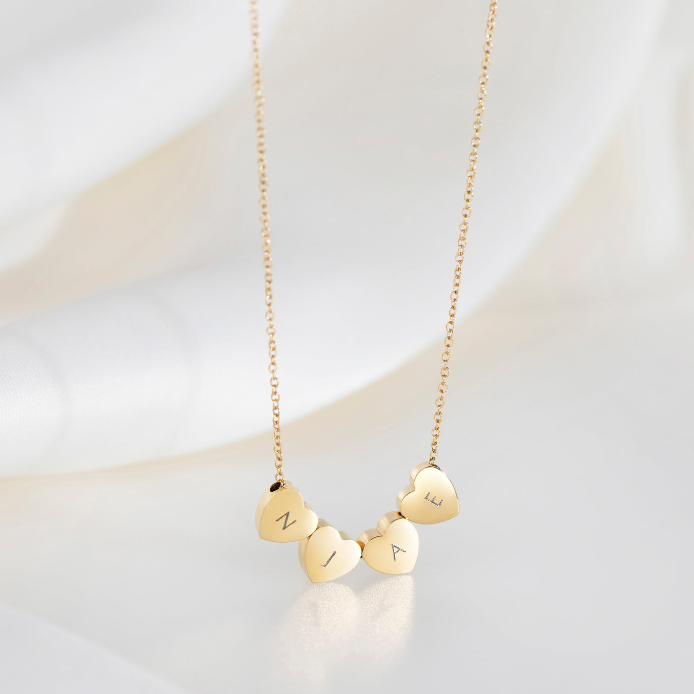 Amo Heart Quadruple Bead Necklace in Gold